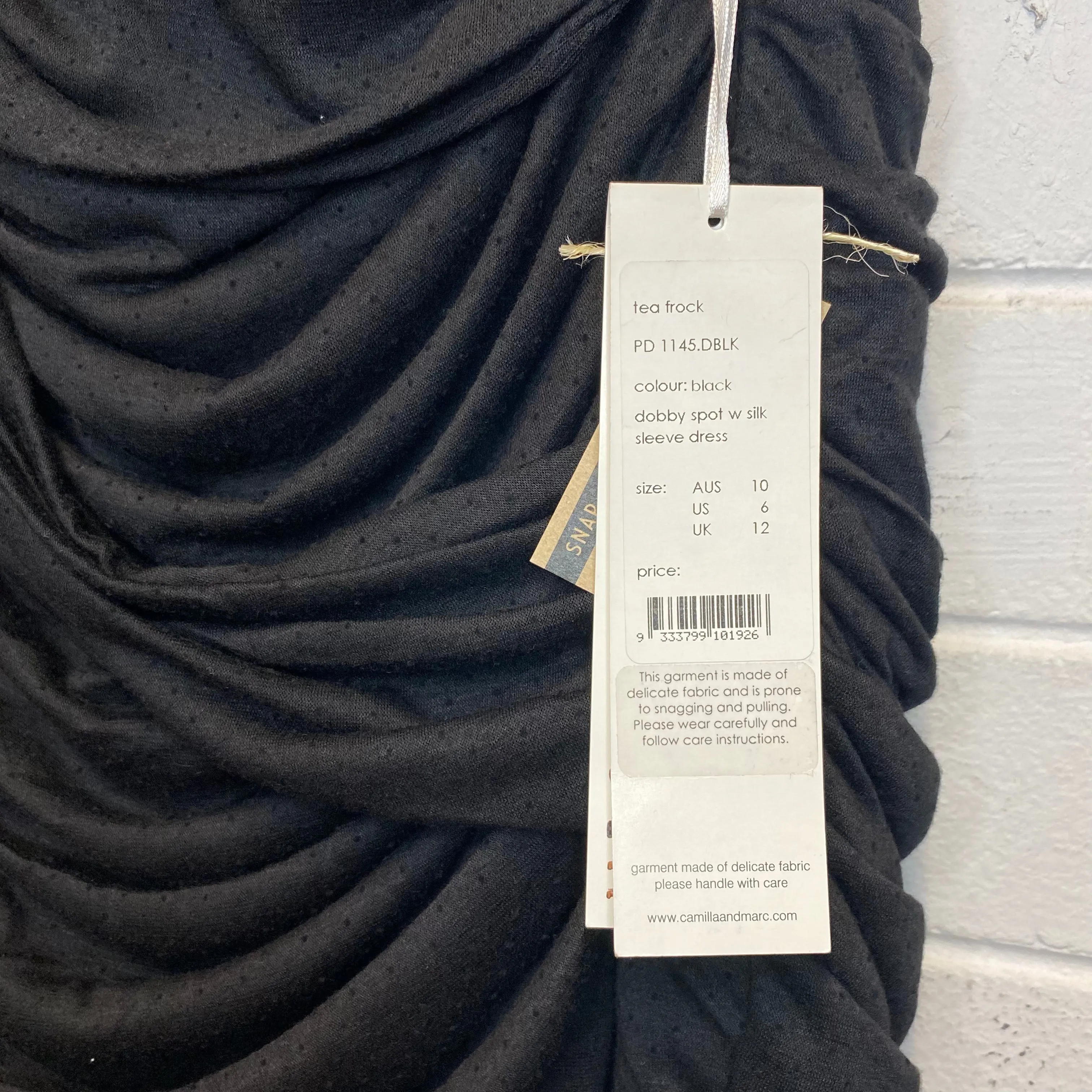 Camilla & Marc Black Sheer Sleeve Ruched Bodycon Mini Dress