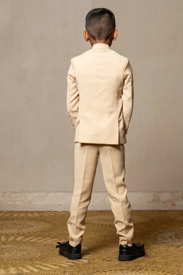 Elegant light beige bandhgala suit with delicate floral embroidery, paired with matching slim-fit trousers for a refined and sophisticated look